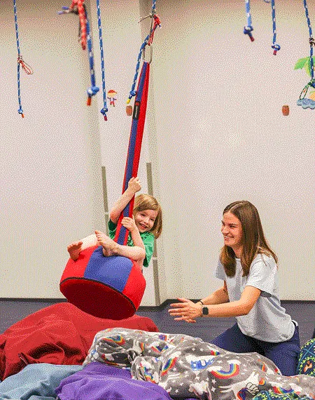 A child participating in a therapy session at South Shore Therapies
