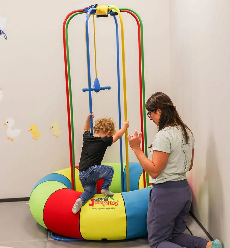 A therapy session focusing on interactive learning at South Shore Therapies 