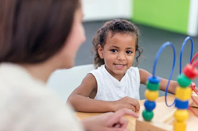 Child involved in a developmental learning activity at South Shore Therapies